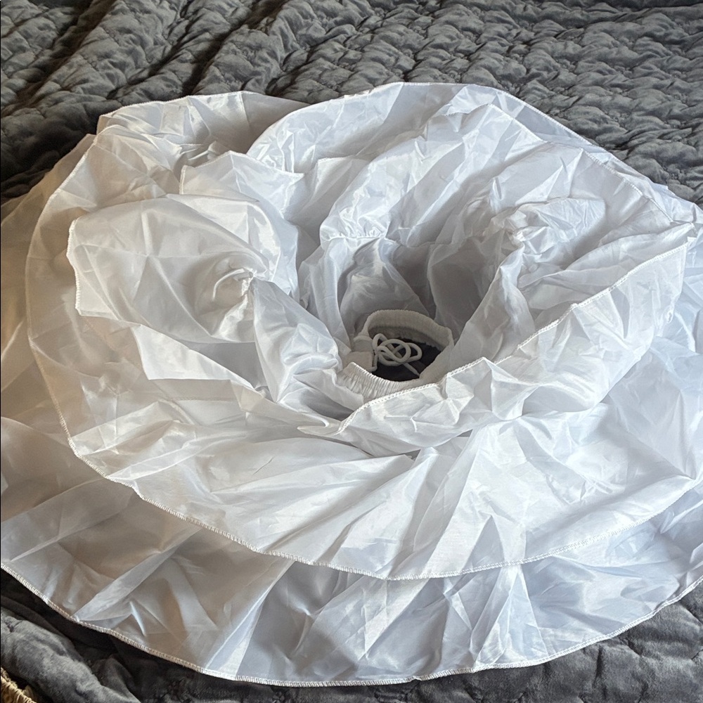 White petticoat hoop to wear under a dress.